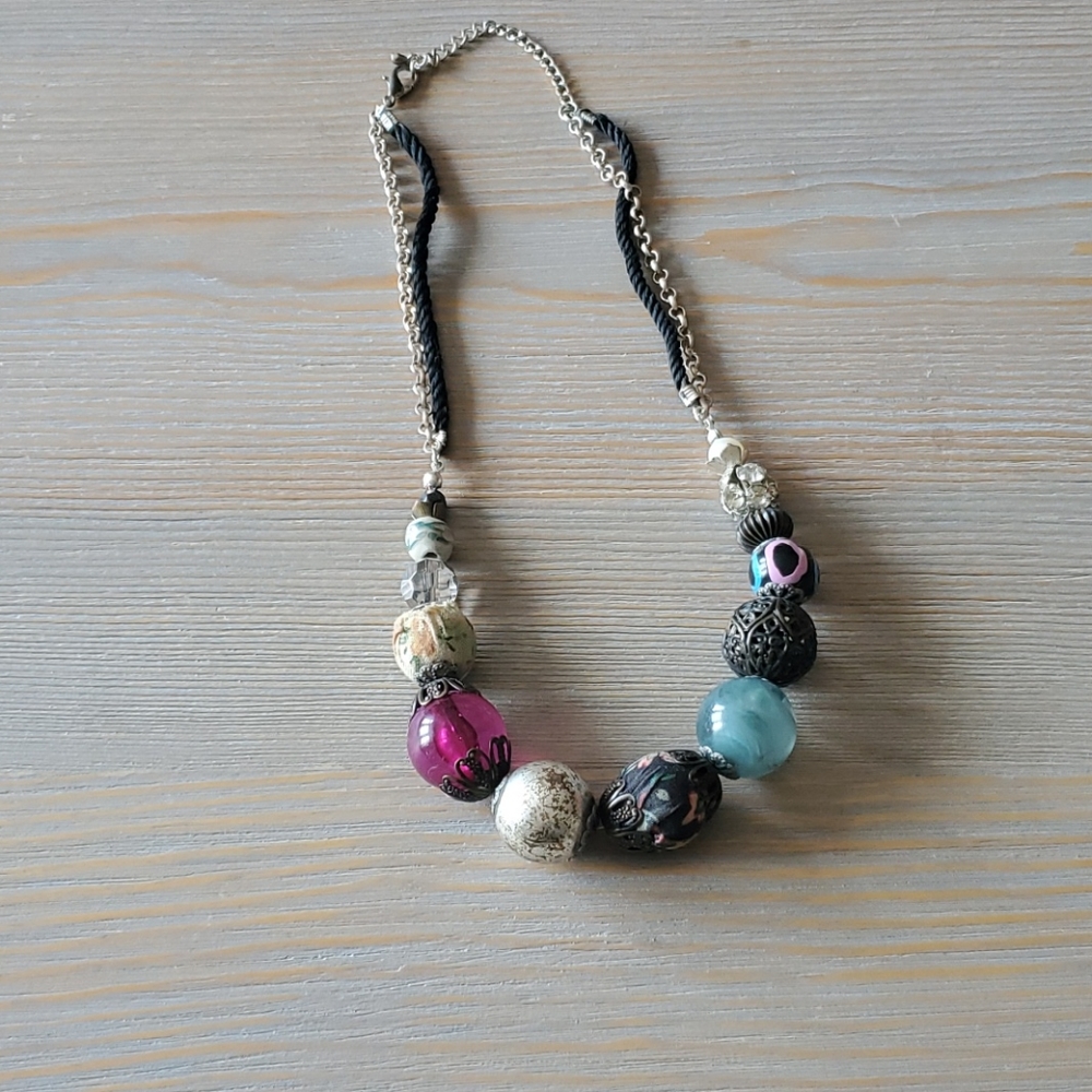 Adorable unique necklace. Needs a new home!